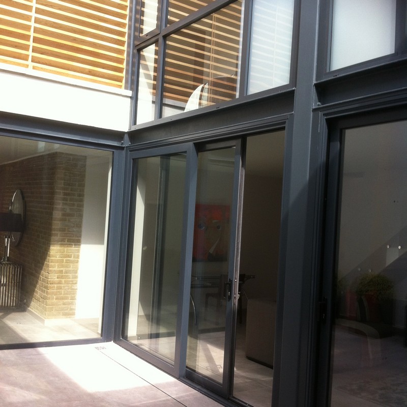 Anthracite aluminium sliding patio doors fitted in Thamesmead