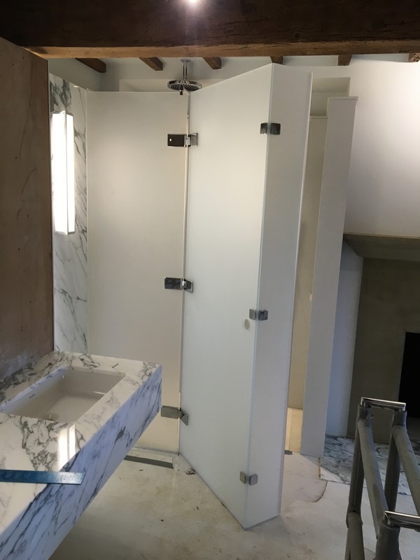 Bespoke frosted glass shower enclosure in Thamesmead luxury bathroom